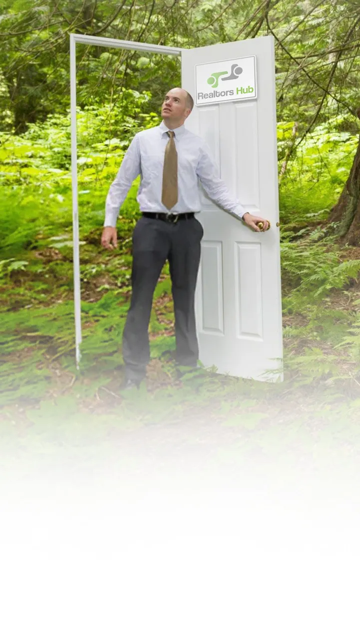 Man in a suit with a leaf in chest pocket